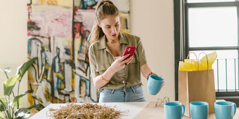 Woman taking pictures for dropshipping