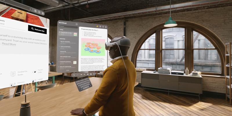Man using Apple Vision Pro for work
