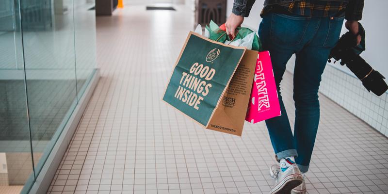 Man walking with shopping bags